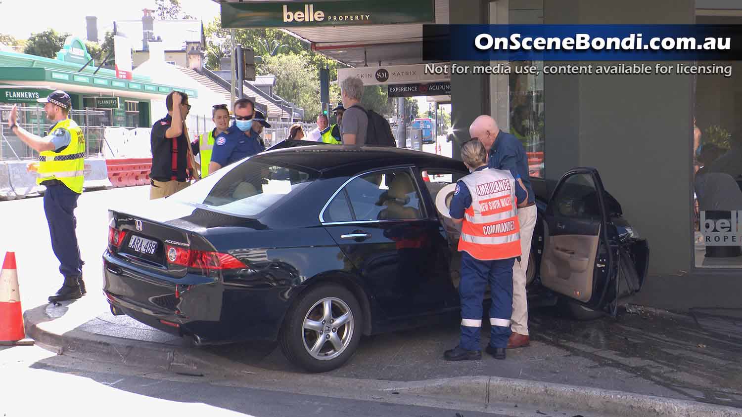 Car crashes into Bondi Junction shopfront after two car crash