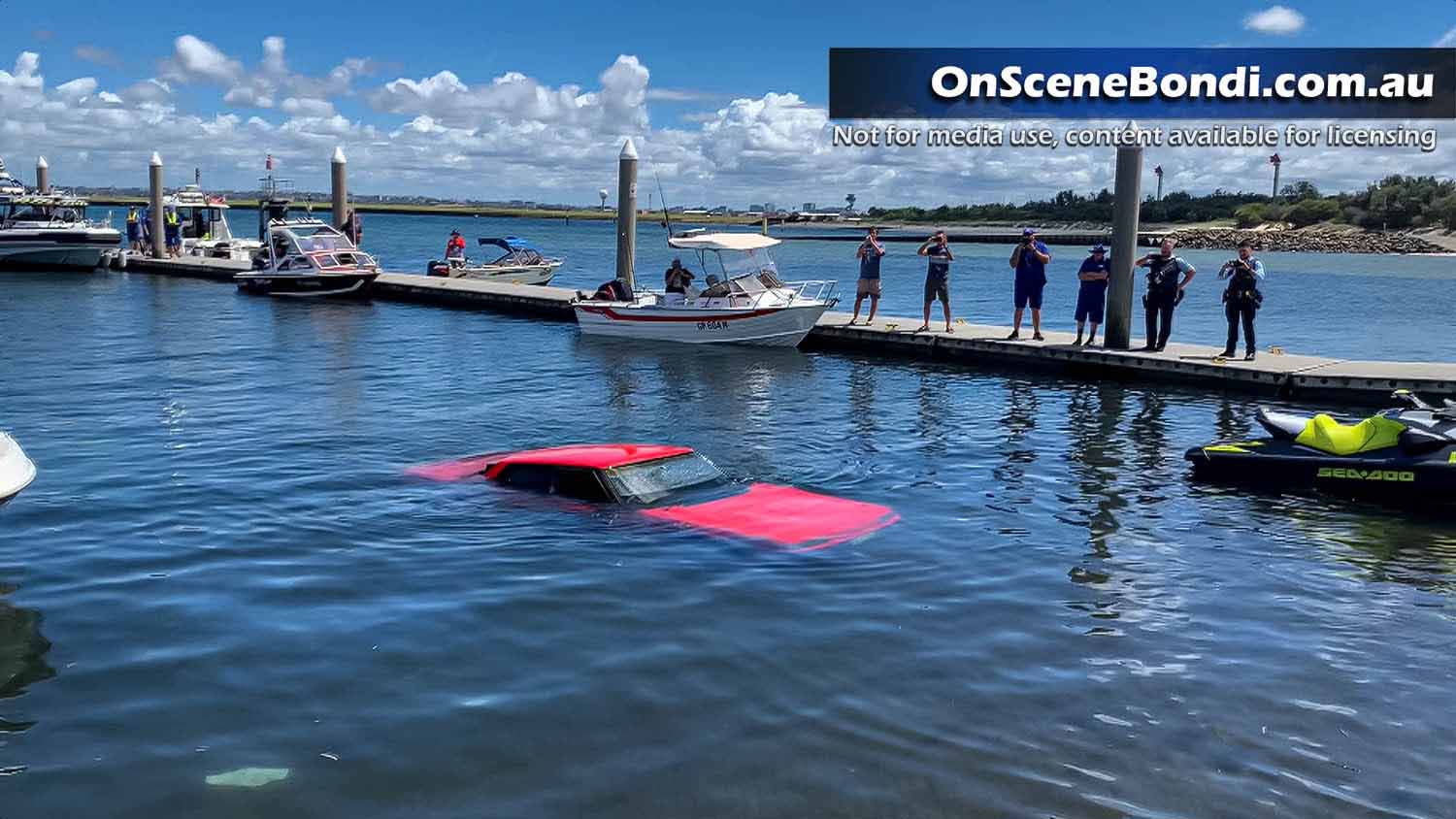 Car plunges underwater after losing traction at Botany Boat Ramp