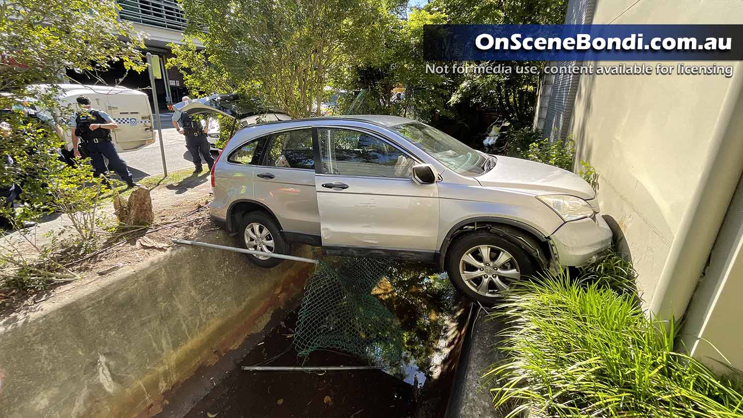 Woman rescued after bizarre crash in Double Bay